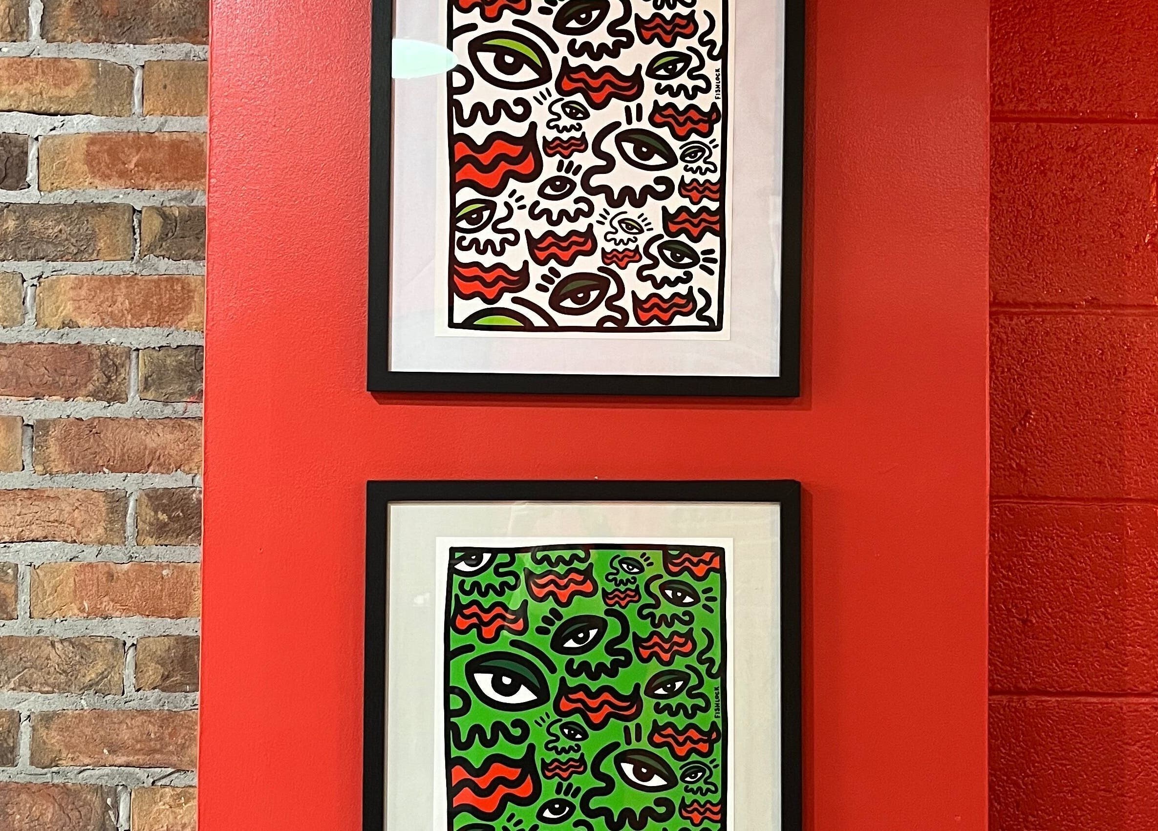 Vibrant abstract art on a red wall at Cult.Collective, Bristol, England, GB showcasing unique style.