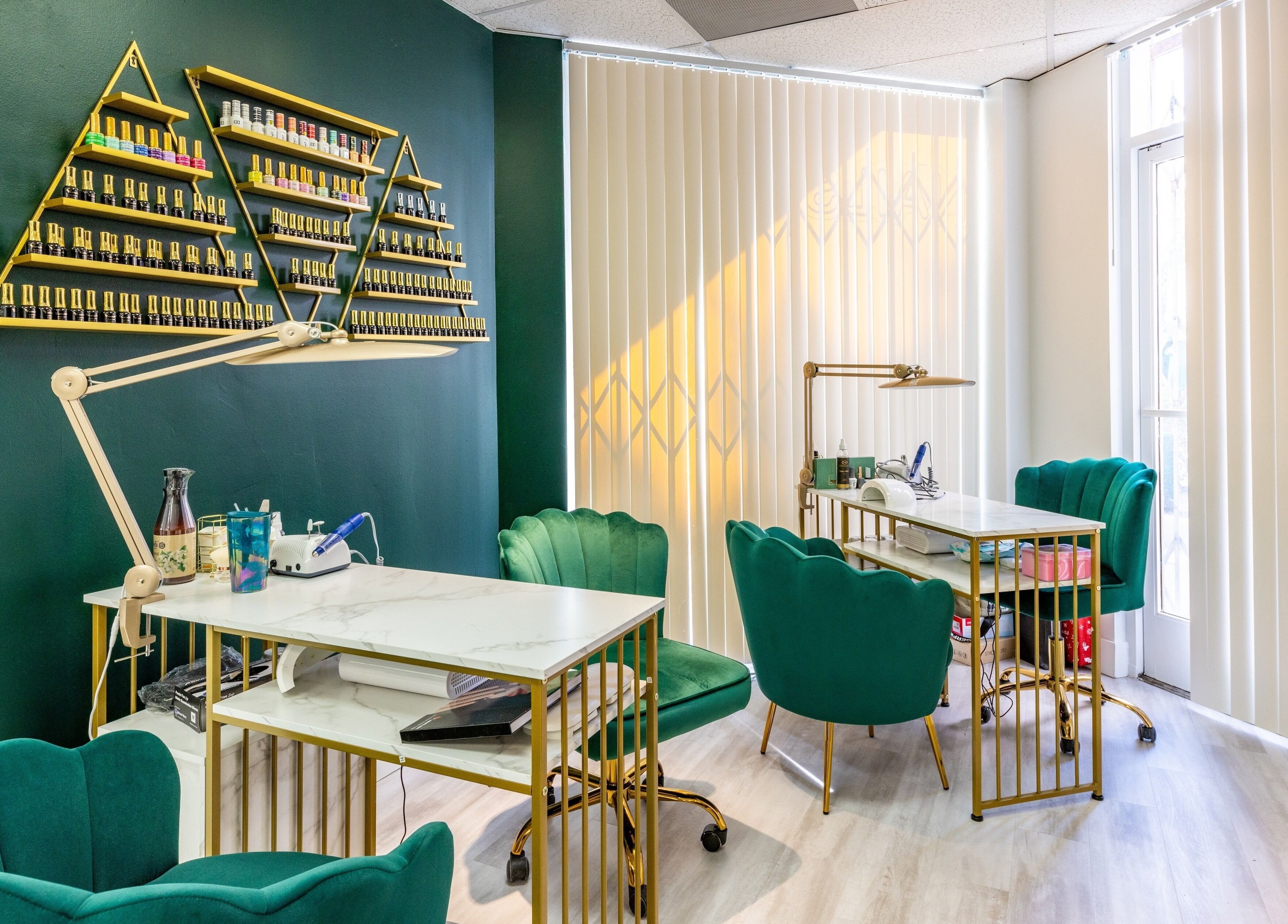 Chic nail salon at Yb Professional Downtown LA, Los Angeles, California, US featuring modern decor and polish display.