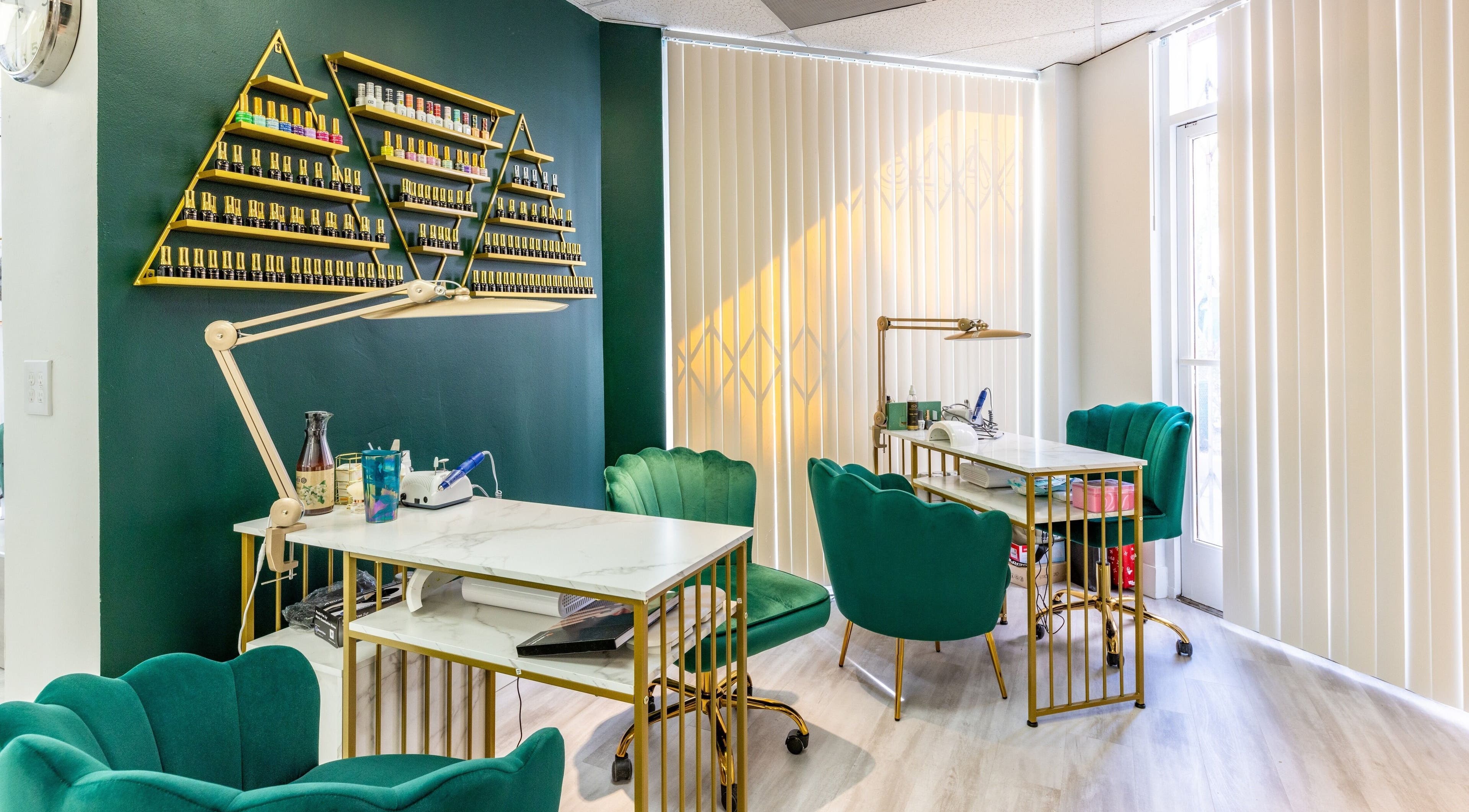 Chic nail salon at Yb Professional Downtown LA, Los Angeles, California, US featuring modern decor and polish display.