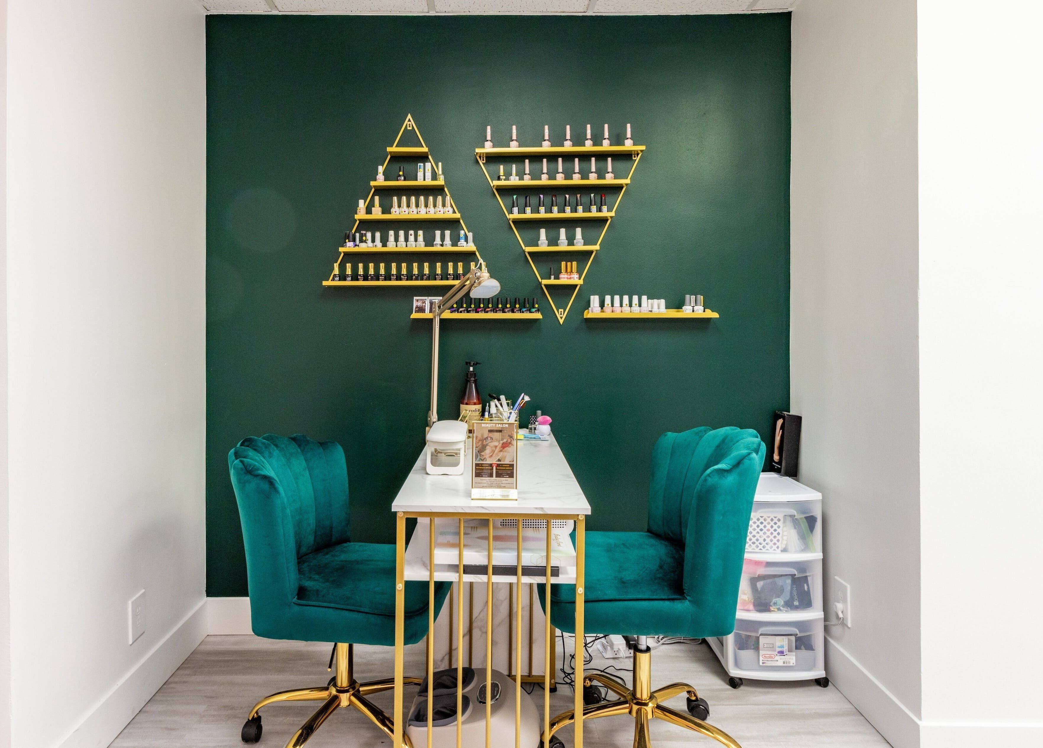 Chic nail station at Yb Professional Downtown LA, Los Angeles, California, US, featuring stylish green decor.