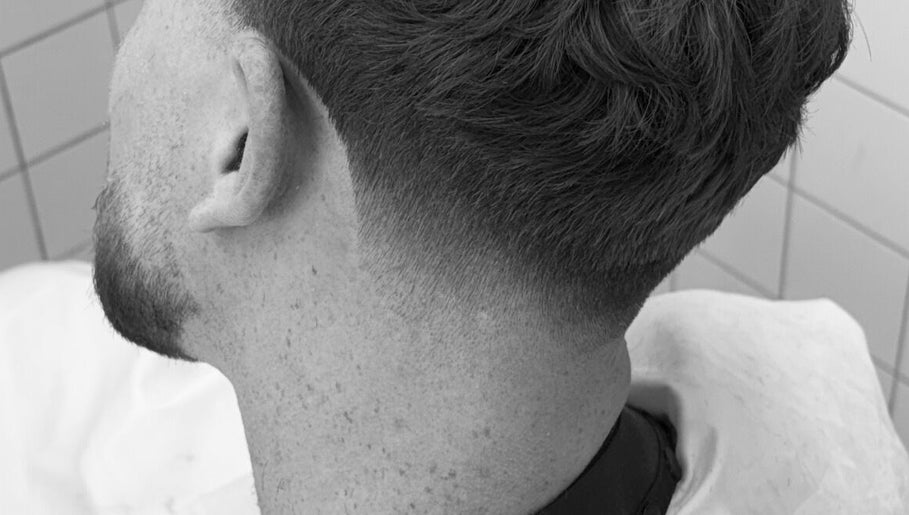 Crisp fade hairstyle at Jack Nolan Hair, County Wicklow, County Wicklow, IE. A modern, sleek men's cut.