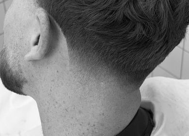 Crisp fade hairstyle at Jack Nolan Hair, County Wicklow, County Wicklow, IE. A modern, sleek men's cut.