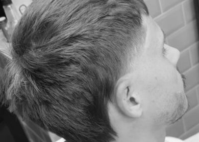 Close-up of a stylish men's haircut at Jack Nolan Hair, County Wicklow, IE.