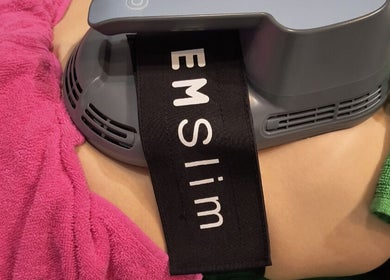 EMSculpt device in use at Elevation Body Boost, Vancouver, British Columbia, CA for body contouring treatment.