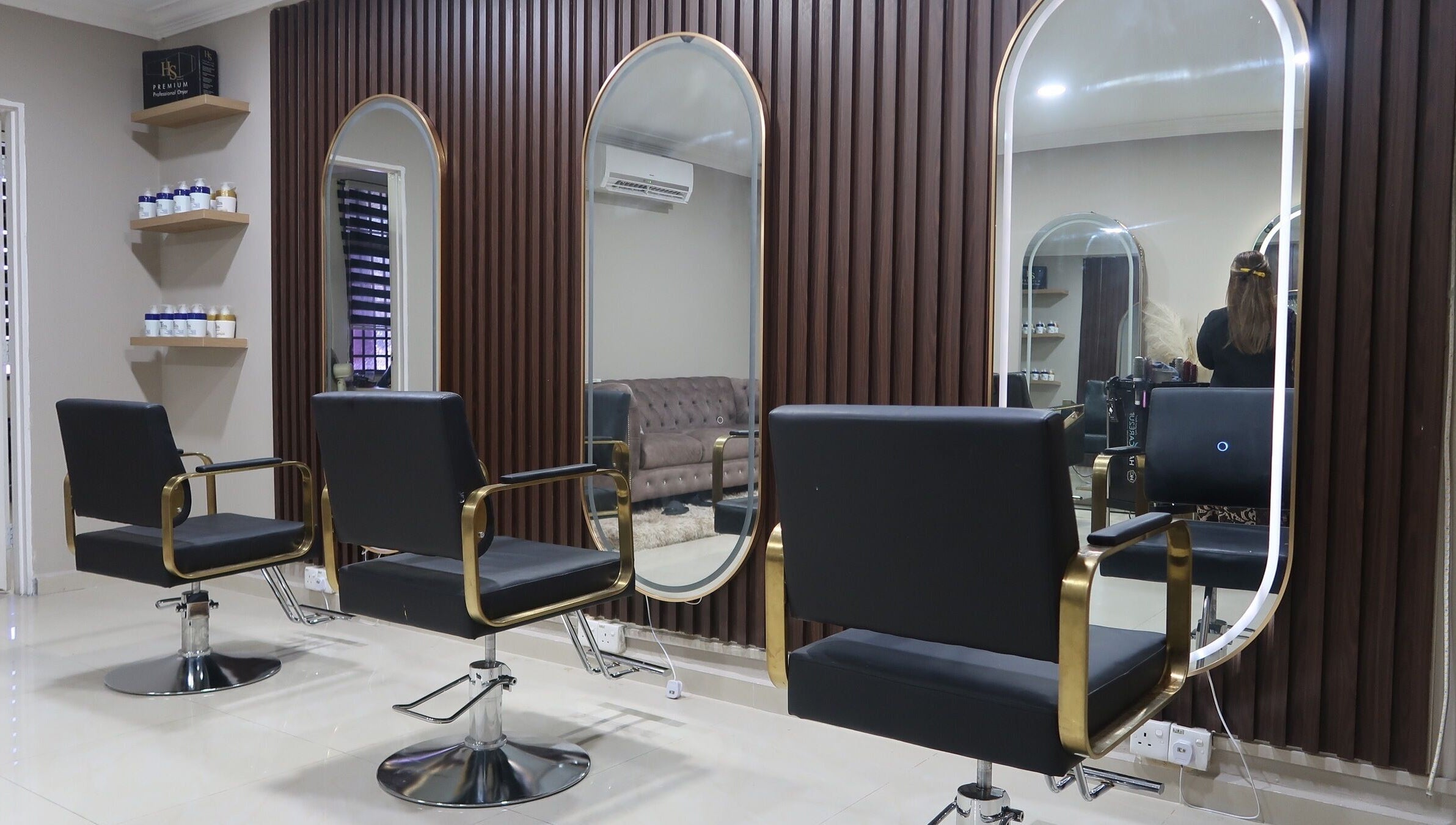 Elegant interior of ALYSSA BEAUTY SALON in Seremban, Negeri Sembilan, MY, featuring modern styling chairs and mirrors.