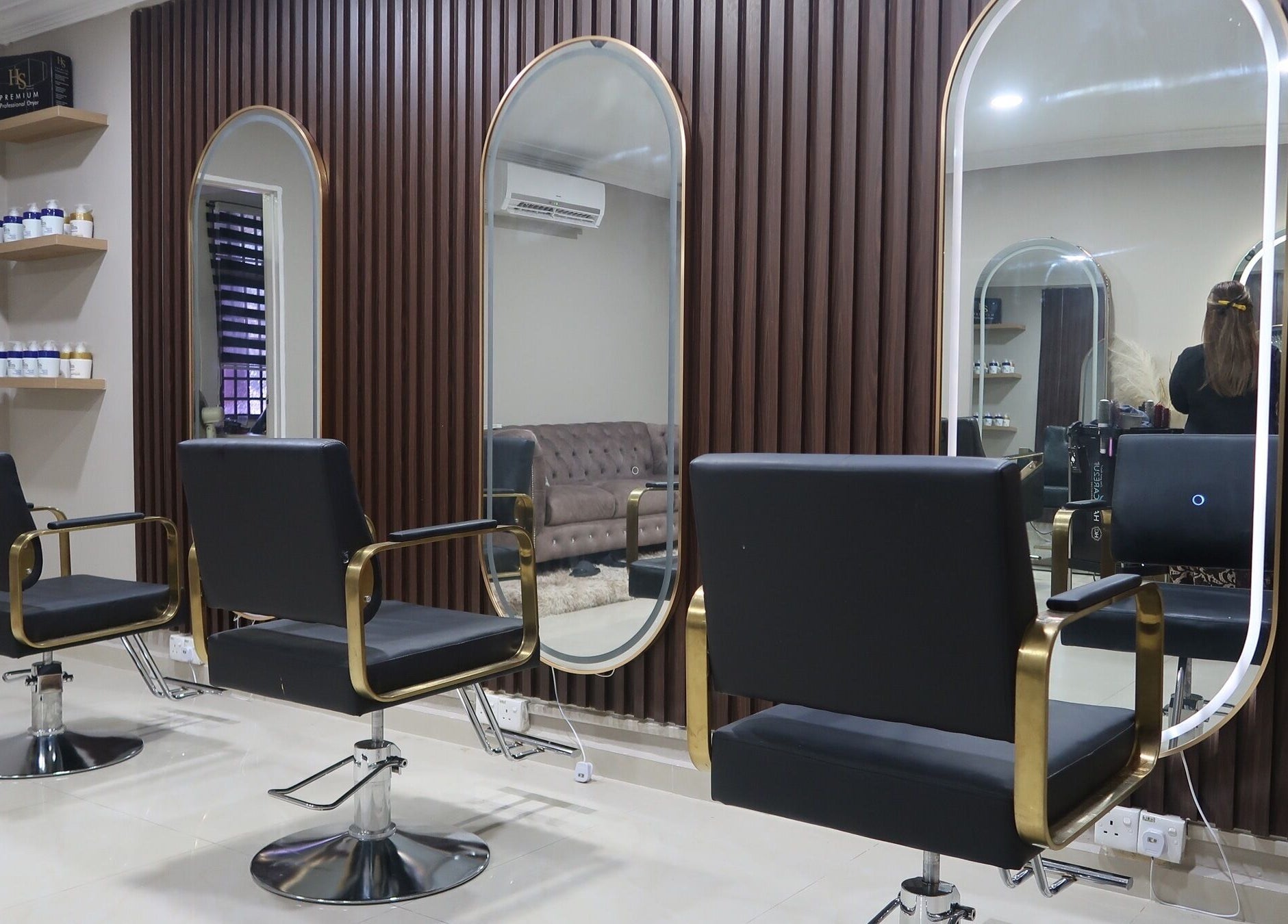 Elegant interior of ALYSSA BEAUTY SALON in Seremban, Negeri Sembilan, MY, featuring modern styling chairs and mirrors.