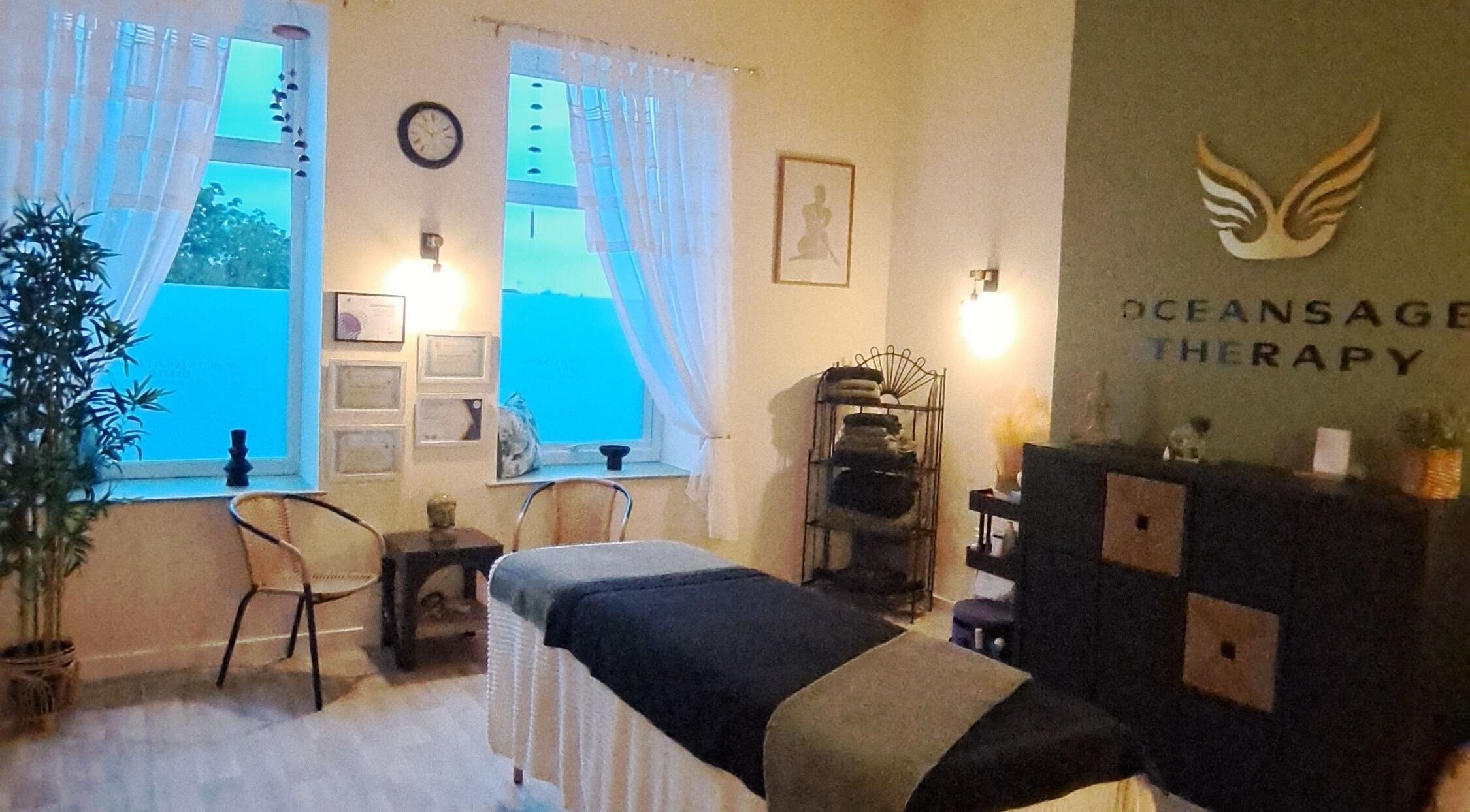 Serene interior of Oceansage Therapy Studio in Stalybridge, England, GB showcasing a therapy bed and calming decor.