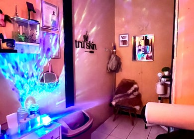Serene interior at Trū Skin Studio, Lucea, Hanover Parish, JM, featuring soft lighting and wellness decor.
