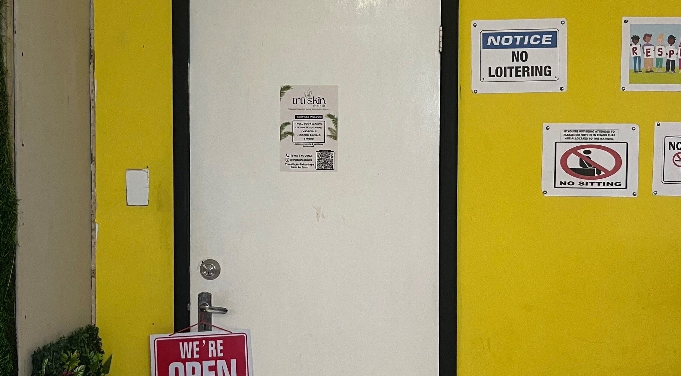 Entrance to Tru Skin Studio in Lucea, Hanover Parish, JM, featuring a welcoming open sign.