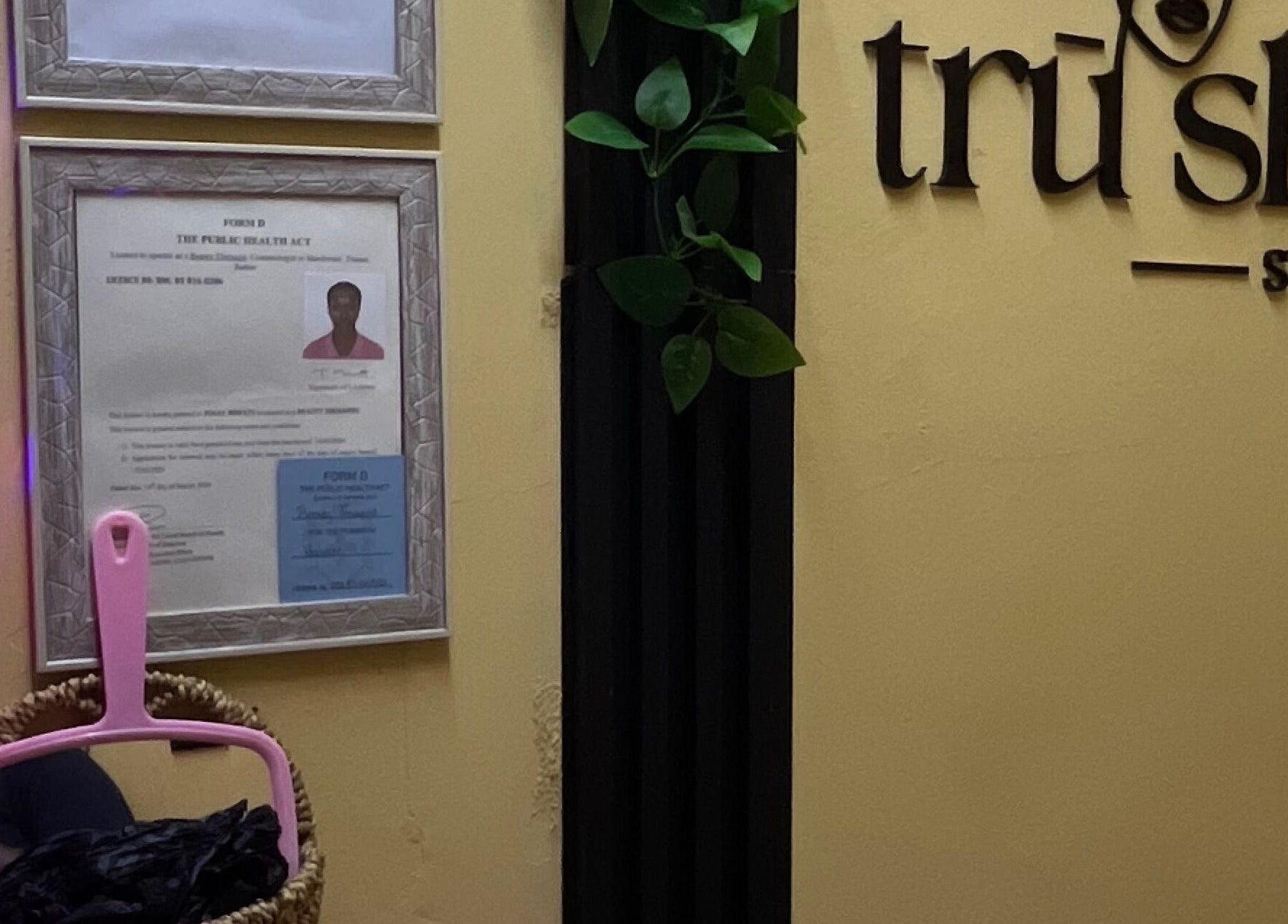 Tru Skin Studio's certificates displayed on a wall in Lucea, Hanover Parish, JM.