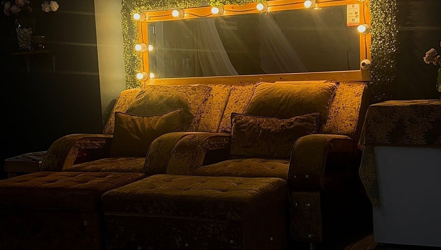 Cozy velvet seating at FARNIESHA BEAUTY SPA, Rawang, Selangor, MY. Relaxing atmosphere with soft lighting.