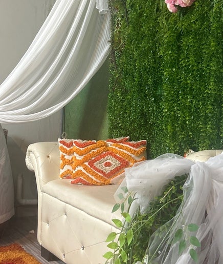 Luxurious seating at FARNIESHA BEAUTY SPA, Rawang, Selangor, MY with lush greenery and elegant decor.