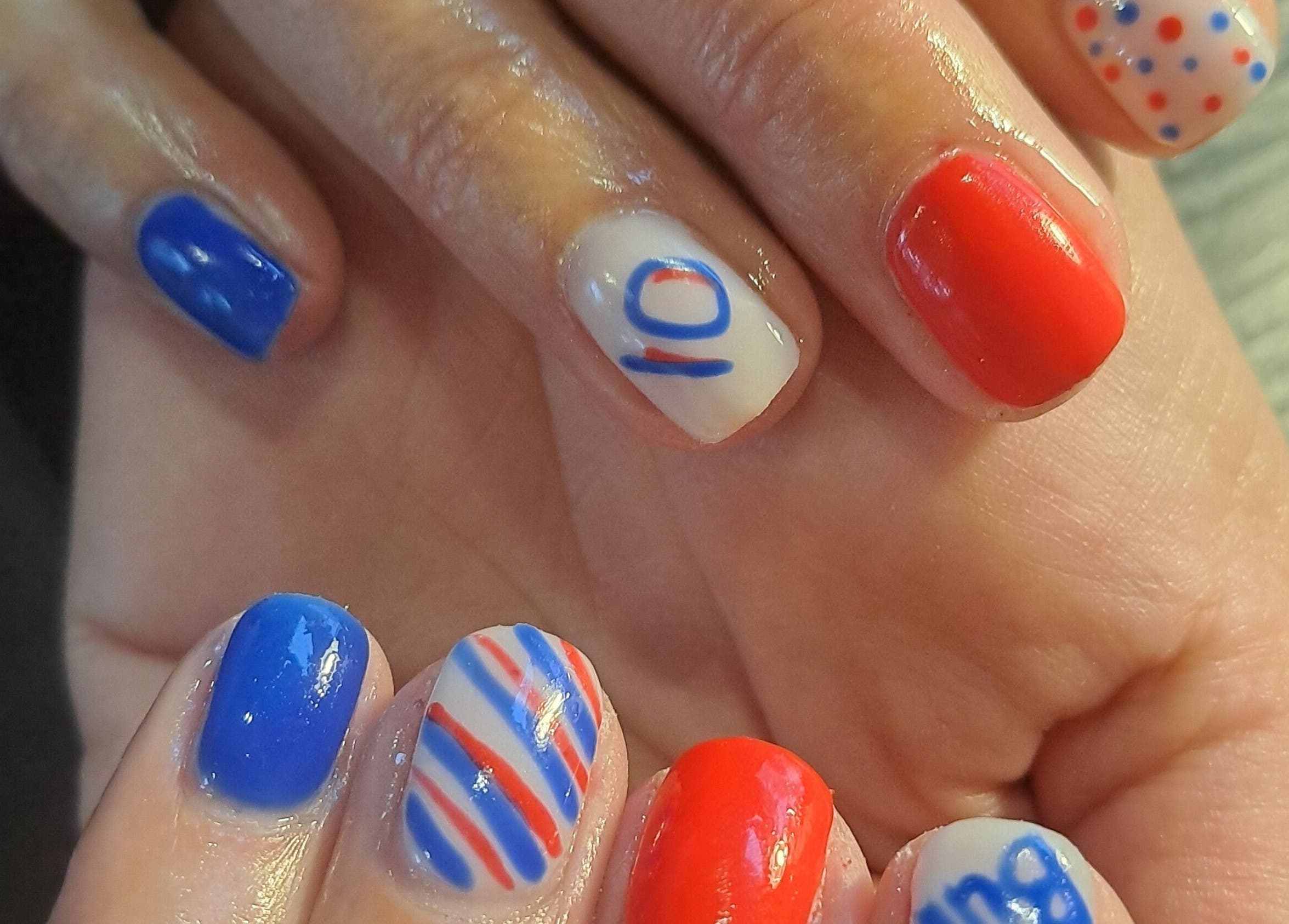 Colorful red, white, and blue nail art at NailIt by Anel, Sedgefield, Western Cape, ZA.