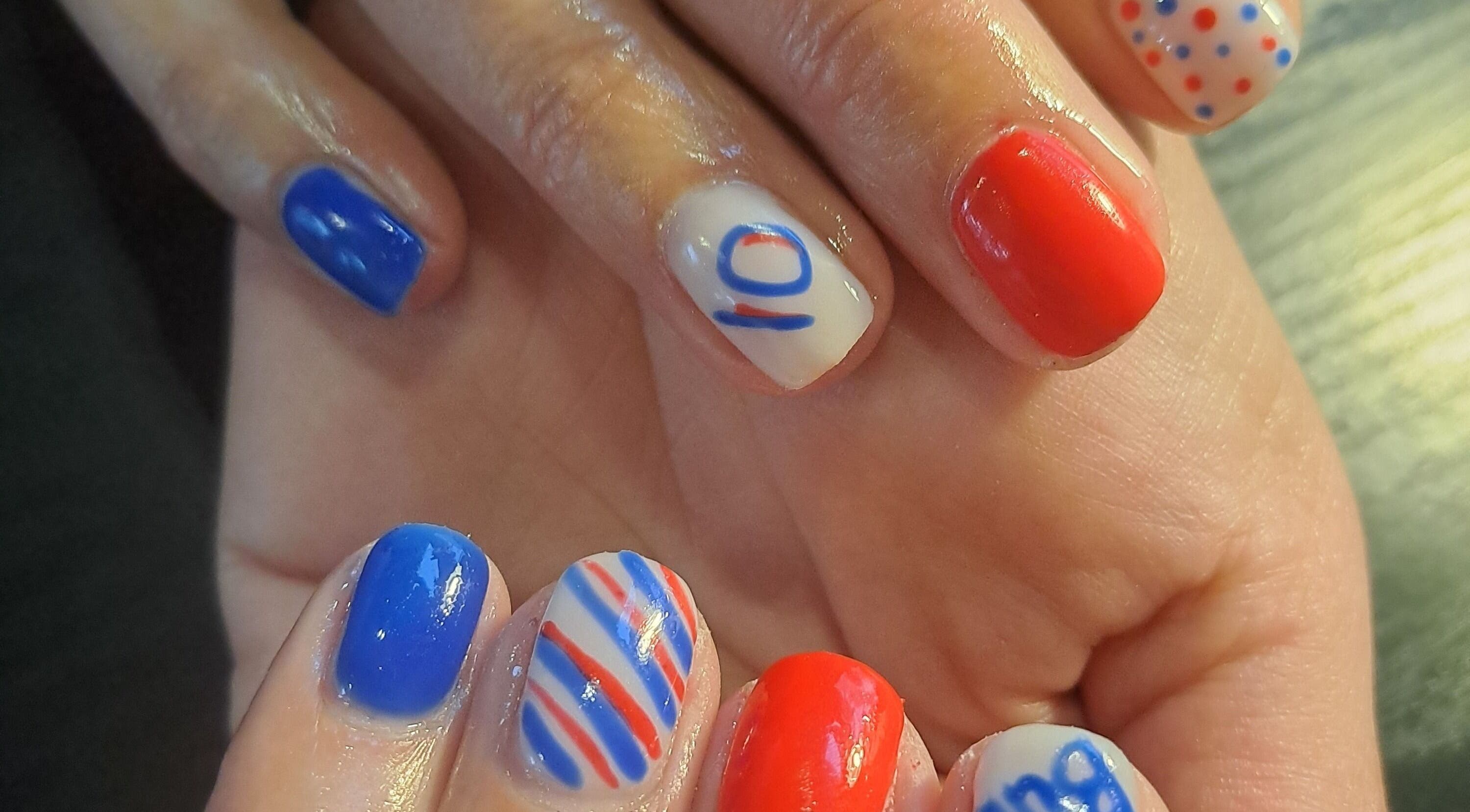 Colorful red, white, and blue nail art at NailIt by Anel, Sedgefield, Western Cape, ZA.