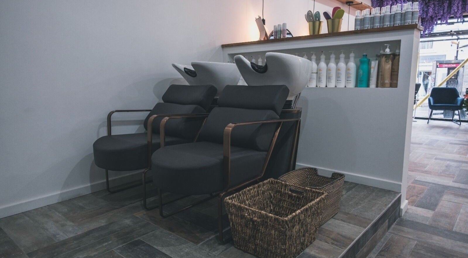 Hair washing stations at Hayden Hair Studio in Bletchley, England, GB offering modern comfort and style.