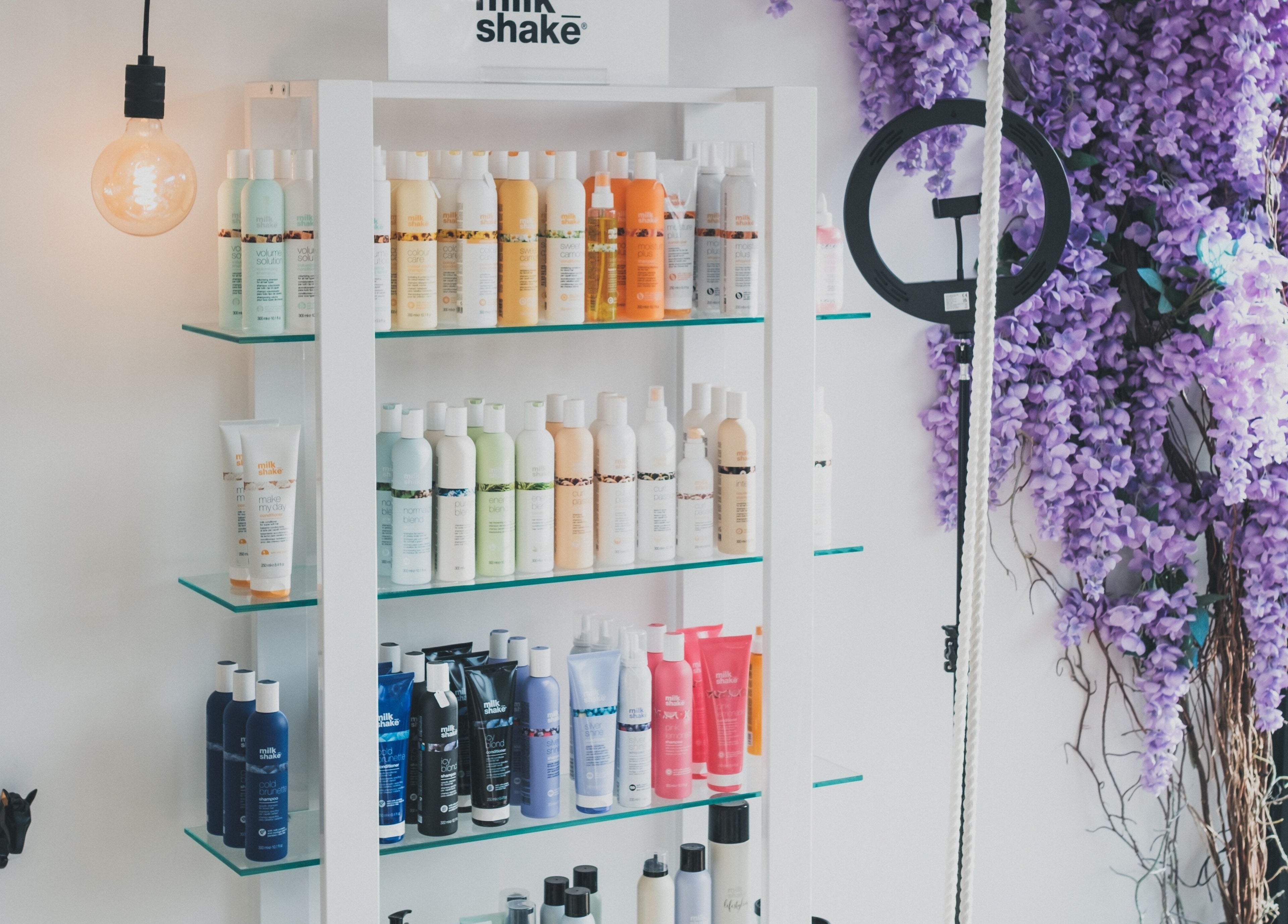Product display at Hayden Hair Studio in Bletchley, England, GB with a variety of hair care products.
