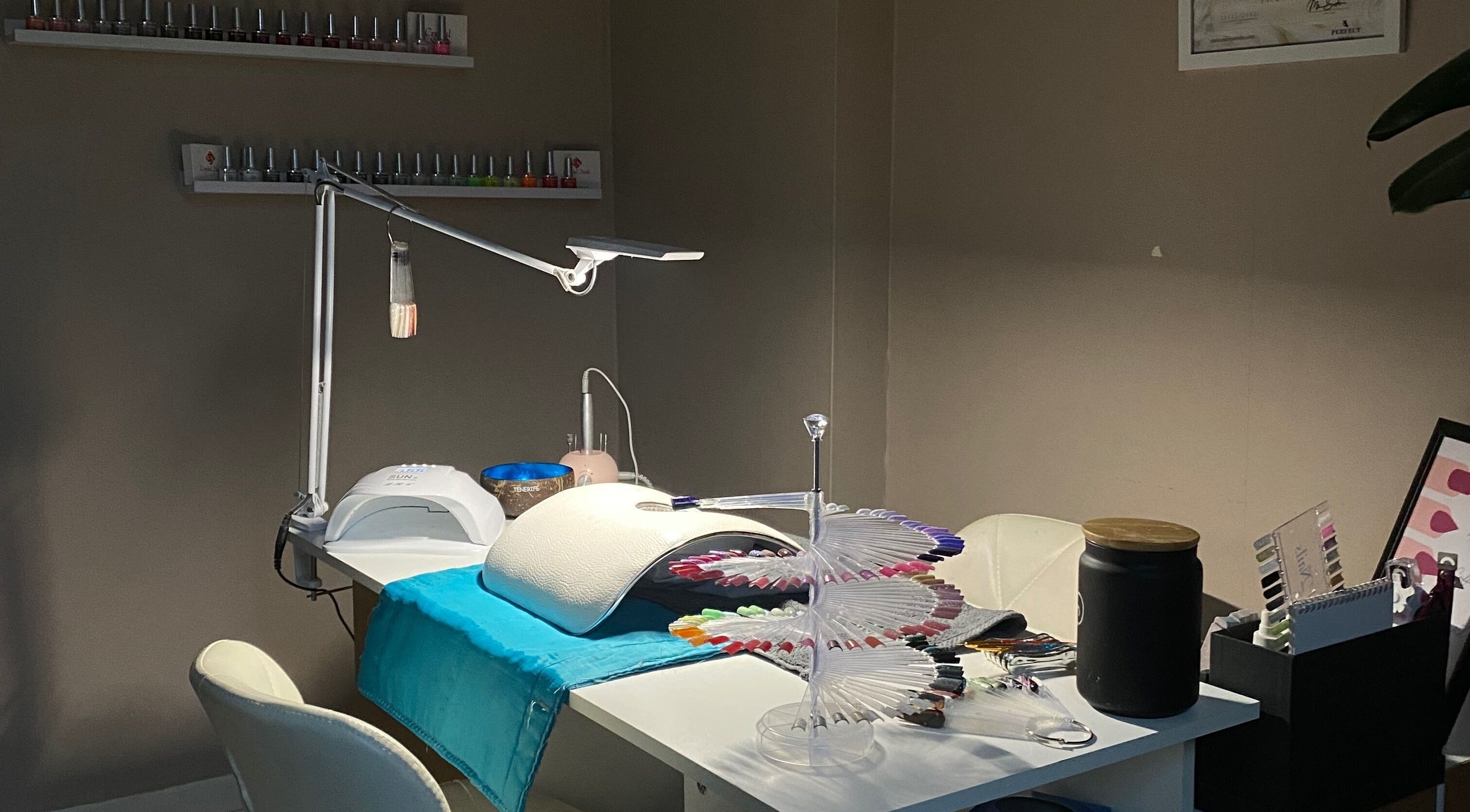 SofiNails (Home-based studio) manicure setup with vibrant polishes in Edinburgh, Scotland, GB.