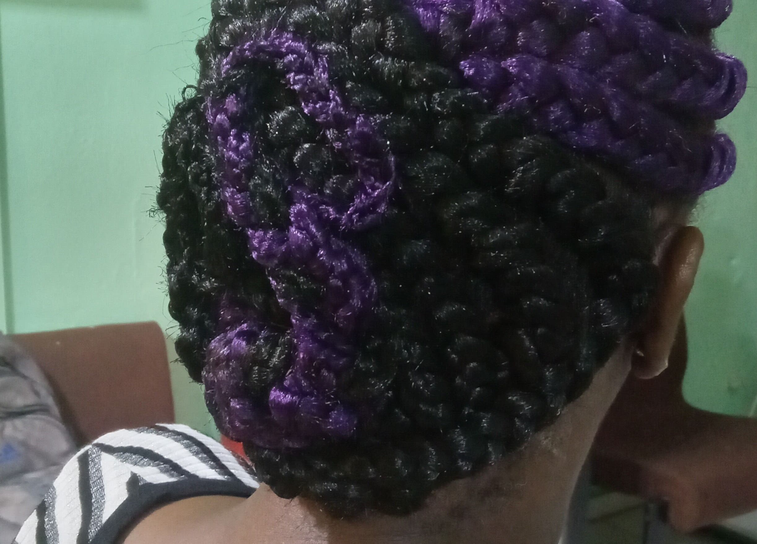 Purple and black elegant braided hairstyle at Origins Natural Beauty, Nassau, New Providence, BS.