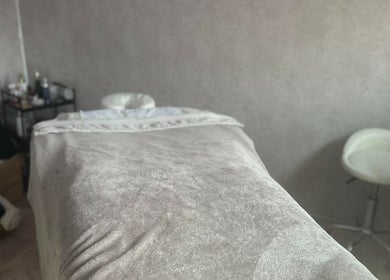 Massage room at Eunoia holistic beauty, Hull, England, GB, featuring a tranquil treatment table.