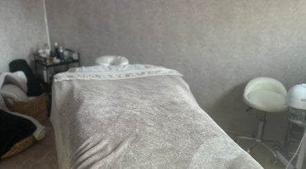 Massage room at Eunoia holistic beauty, Hull, England, GB, featuring a tranquil treatment table.
