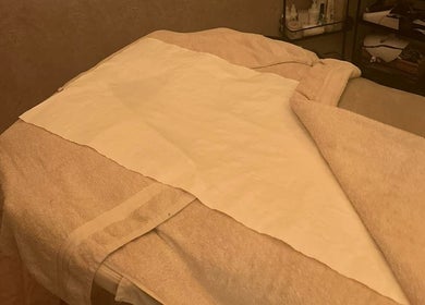 Relaxing treatment bed at Eunoia holistic beauty in Hull, England, GB, offering tranquil wellness experiences.