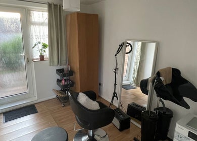 Cozy beauty workspace at Nine did Mine, London, England, GB. Features styling chair and mirror.