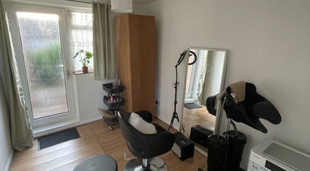 Cozy beauty workspace at Nine did Mine, London, England, GB. Features styling chair and mirror.