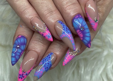 Colorful nail art with pink and blue design at Raw Claws Beauty, Lismore, New South Wales, AU.