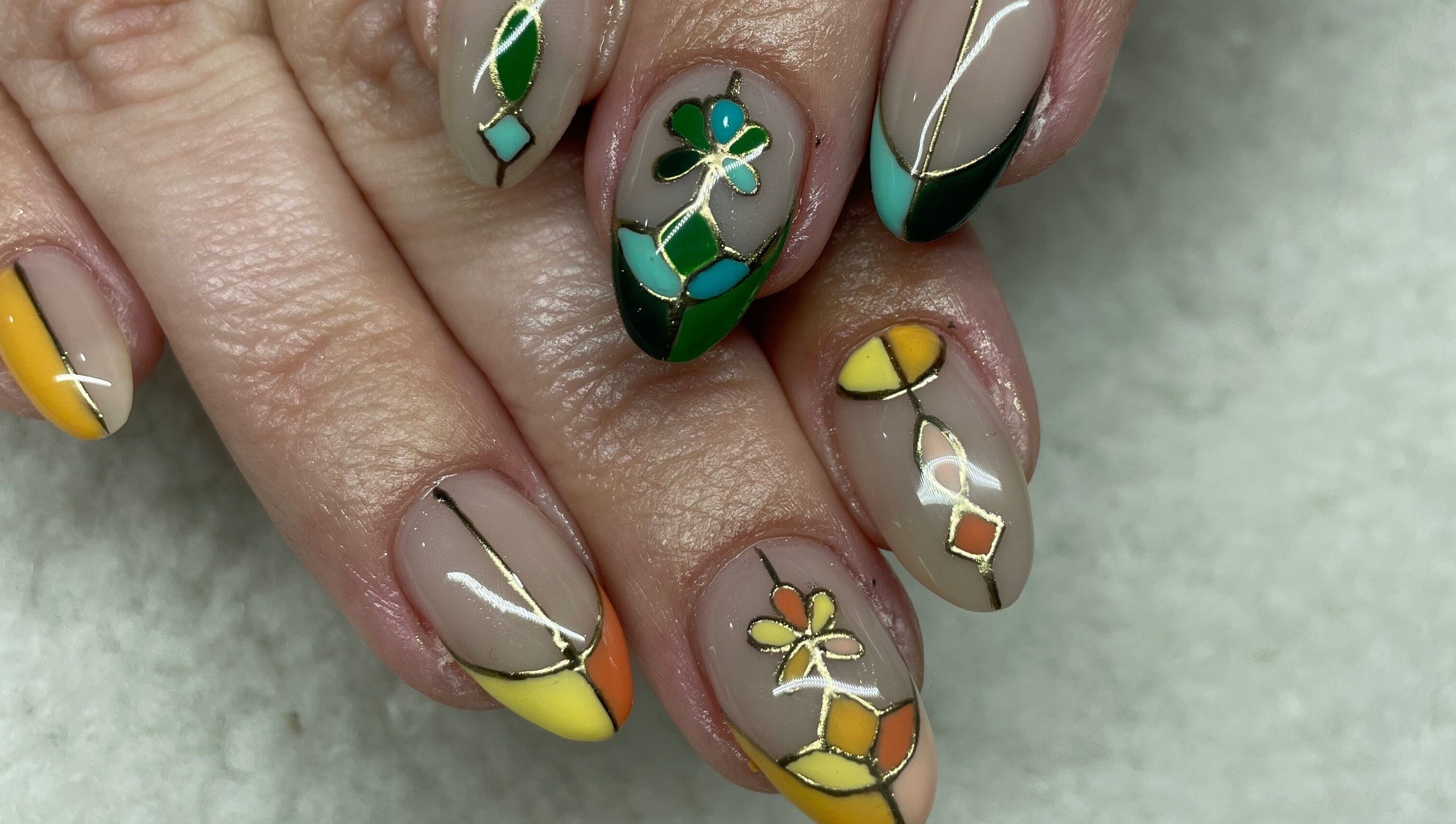 Colorful geometric nail art at Raw Claws Beauty, Lismore, New South Wales, AU.
