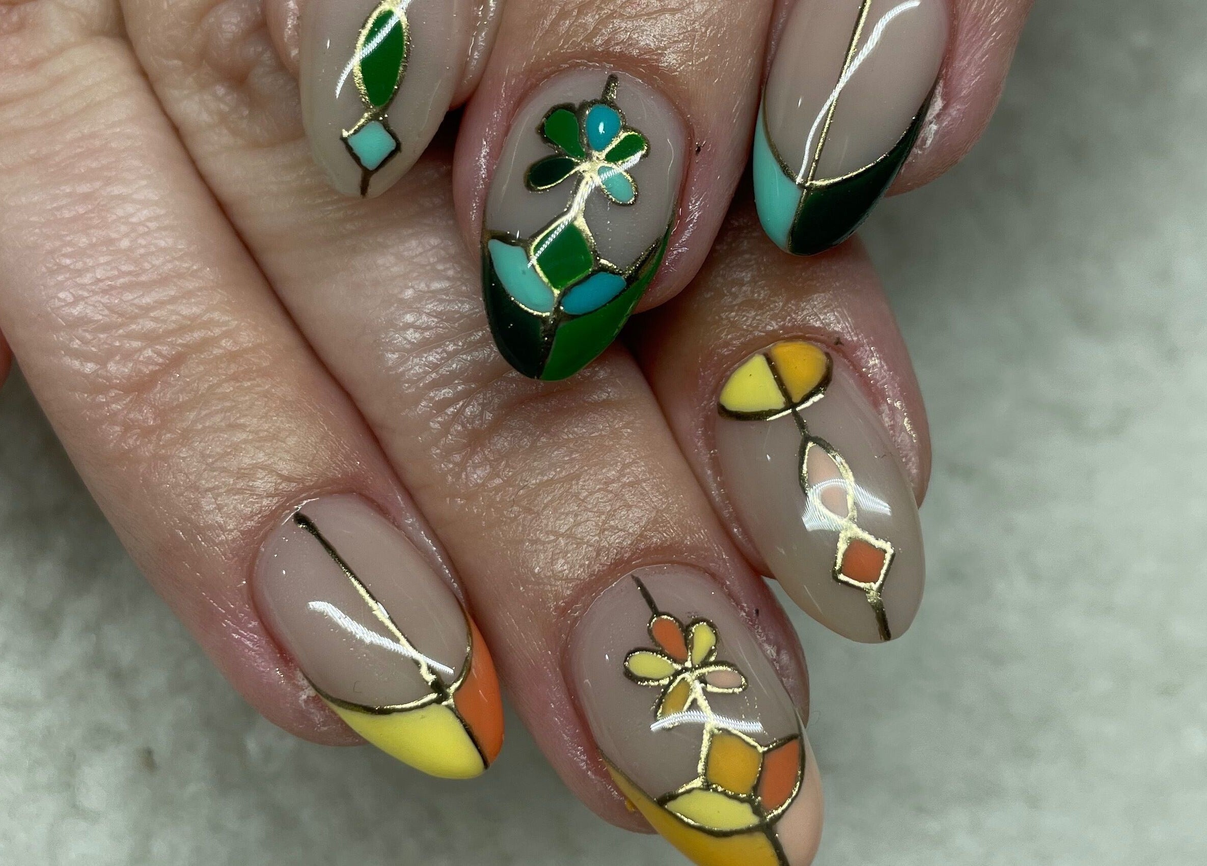 Colorful geometric nail art at Raw Claws Beauty, Lismore, New South Wales, AU.