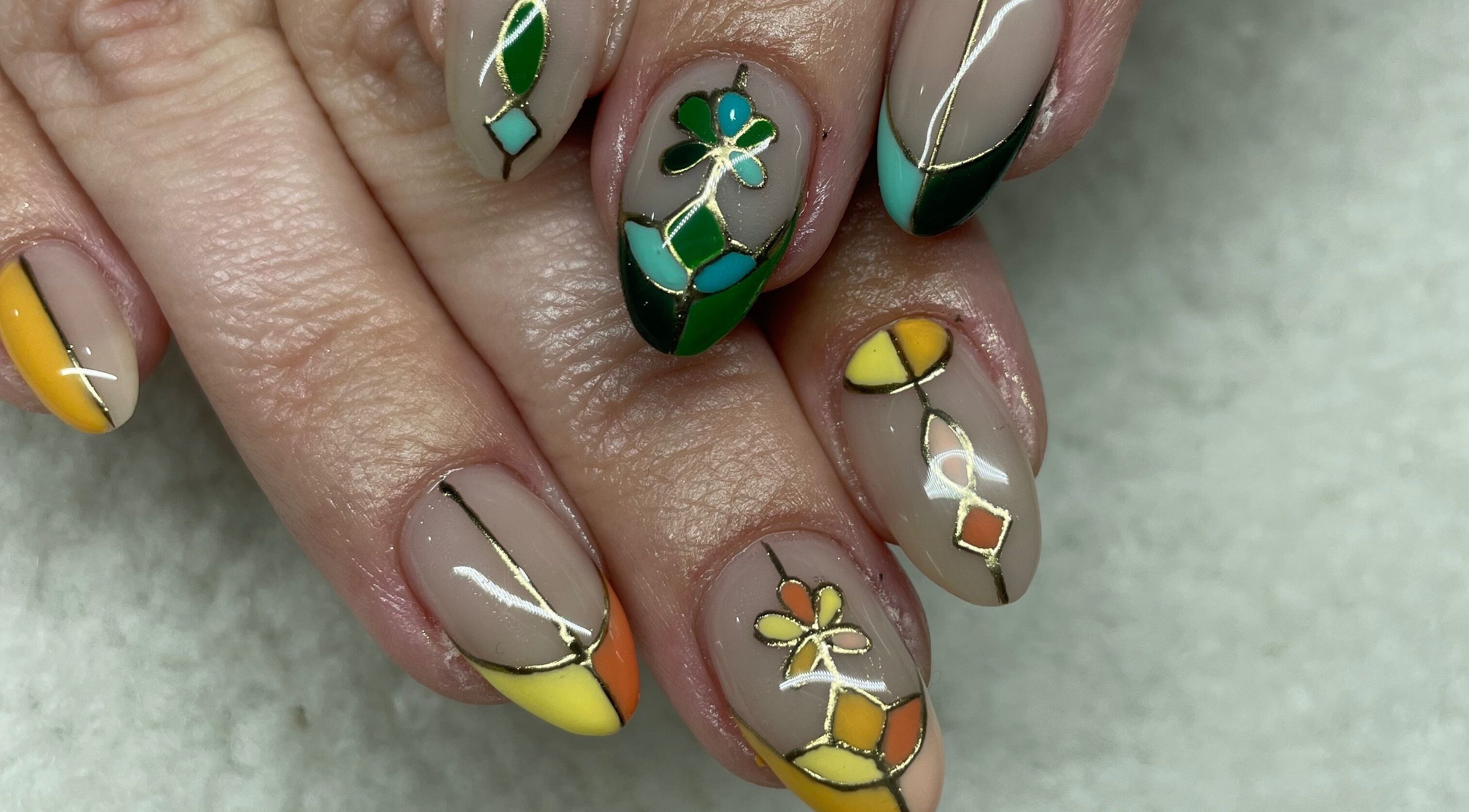 Colorful geometric nail art at Raw Claws Beauty, Lismore, New South Wales, AU.