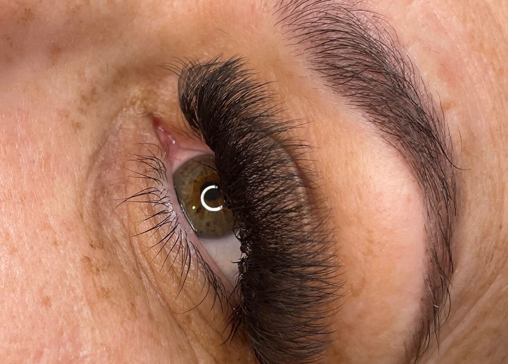 Close-up of eyelash extension at Raw Claws Beauty, Lismore, New South Wales, AU, showcasing full, voluminous lashes.