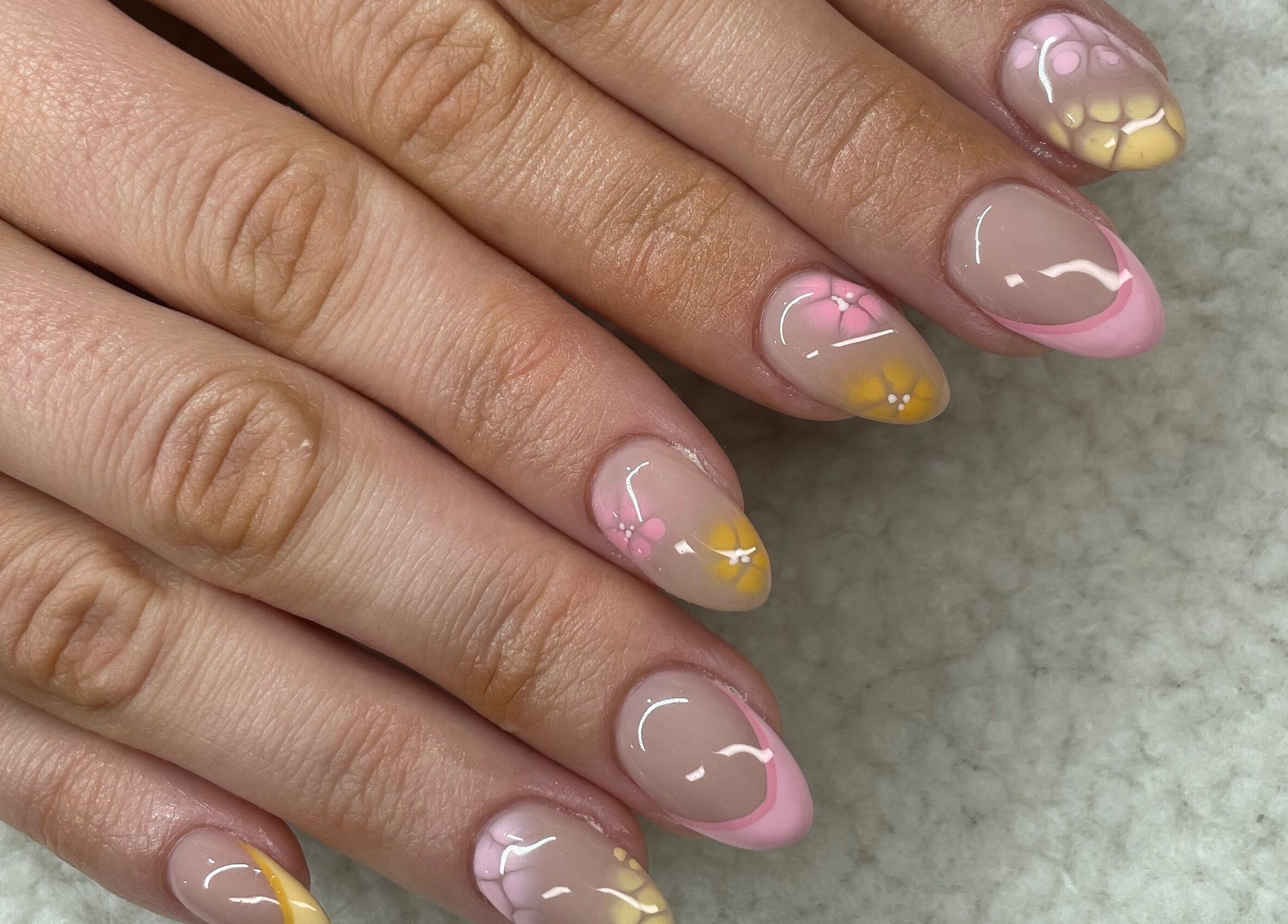 Floral nail art with pastel colors at Raw Claws Beauty in Lismore, New South Wales, AU.