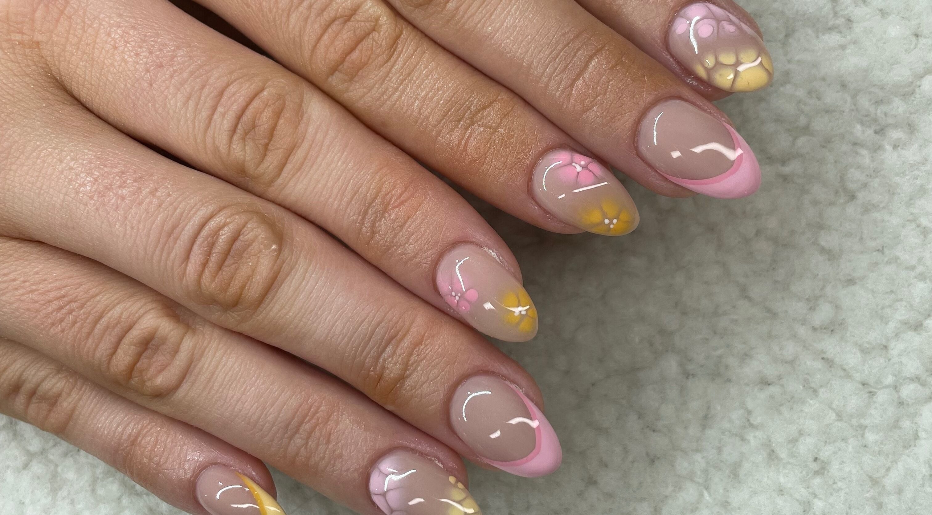 Floral nail art with pastel colors at Raw Claws Beauty in Lismore, New South Wales, AU.