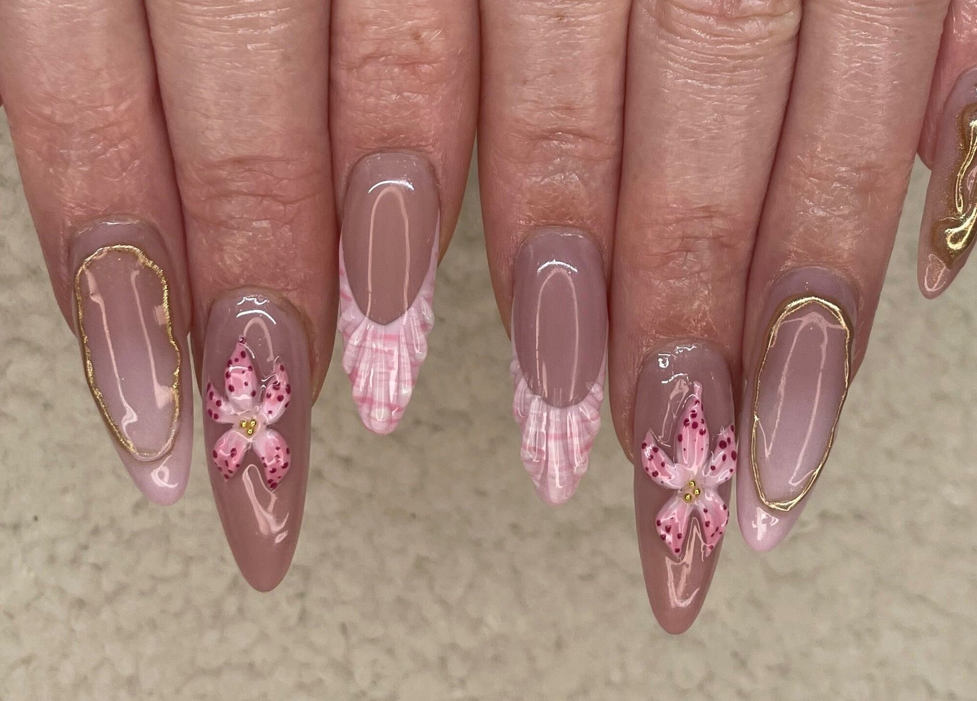 Elegant floral nail art at Raw Claws Beauty, Lismore, New South Wales, AU. Perfect for a stylish look.