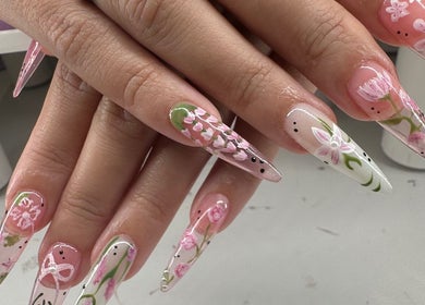 Intricate floral nail art design at KCNailStudio, Logan Reserve, Queensland, AU showcasing delicate craftsmanship.