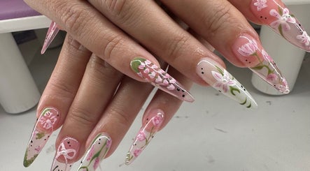 Intricate floral nail art design at KCNailStudio, Logan Reserve, Queensland, AU showcasing delicate craftsmanship.