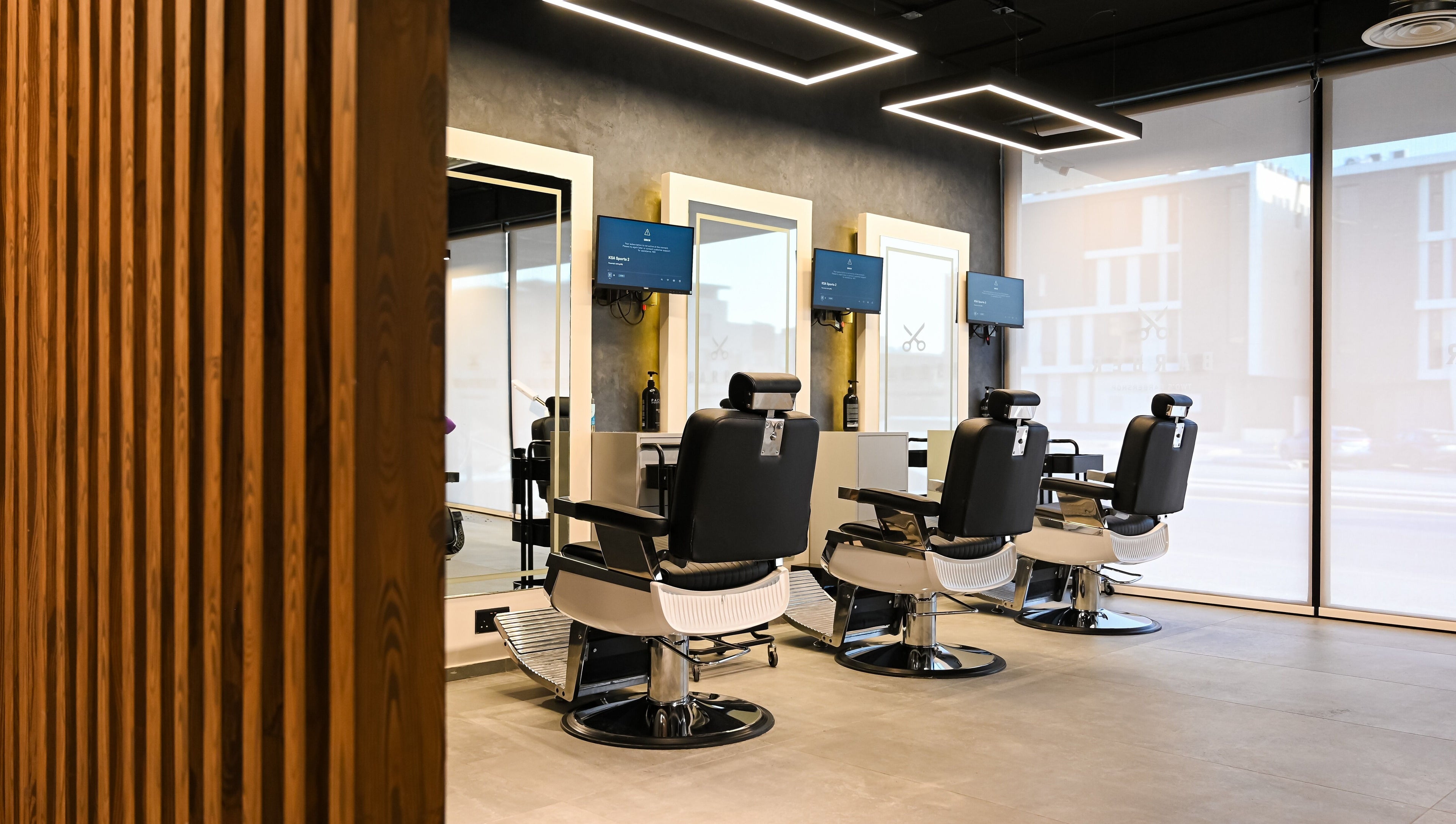 Modern barber chairs at Two's Barbershop, Riyadh, Riyadh Province, SA.