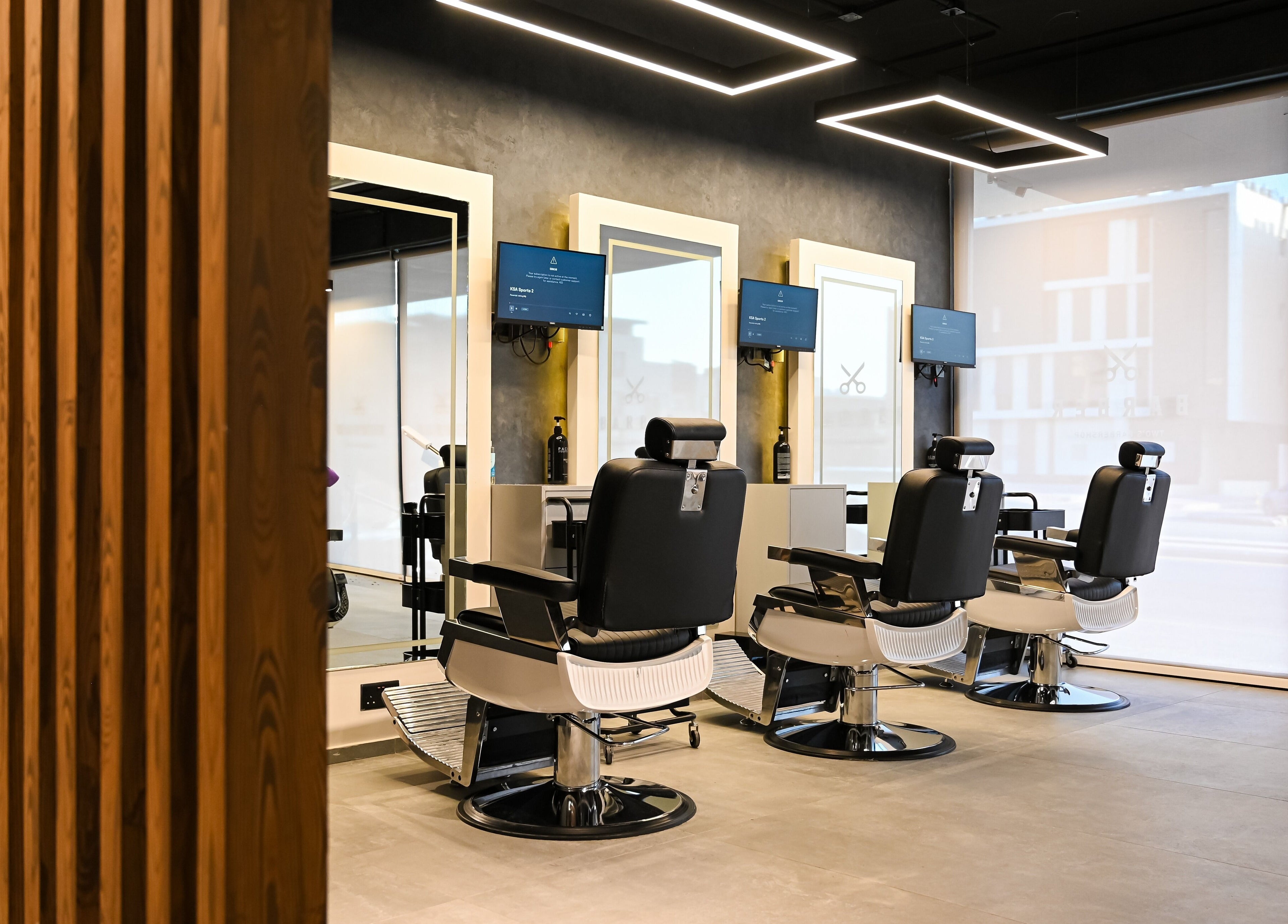 Modern barber chairs at Two's Barbershop, Riyadh, Riyadh Province, SA.
