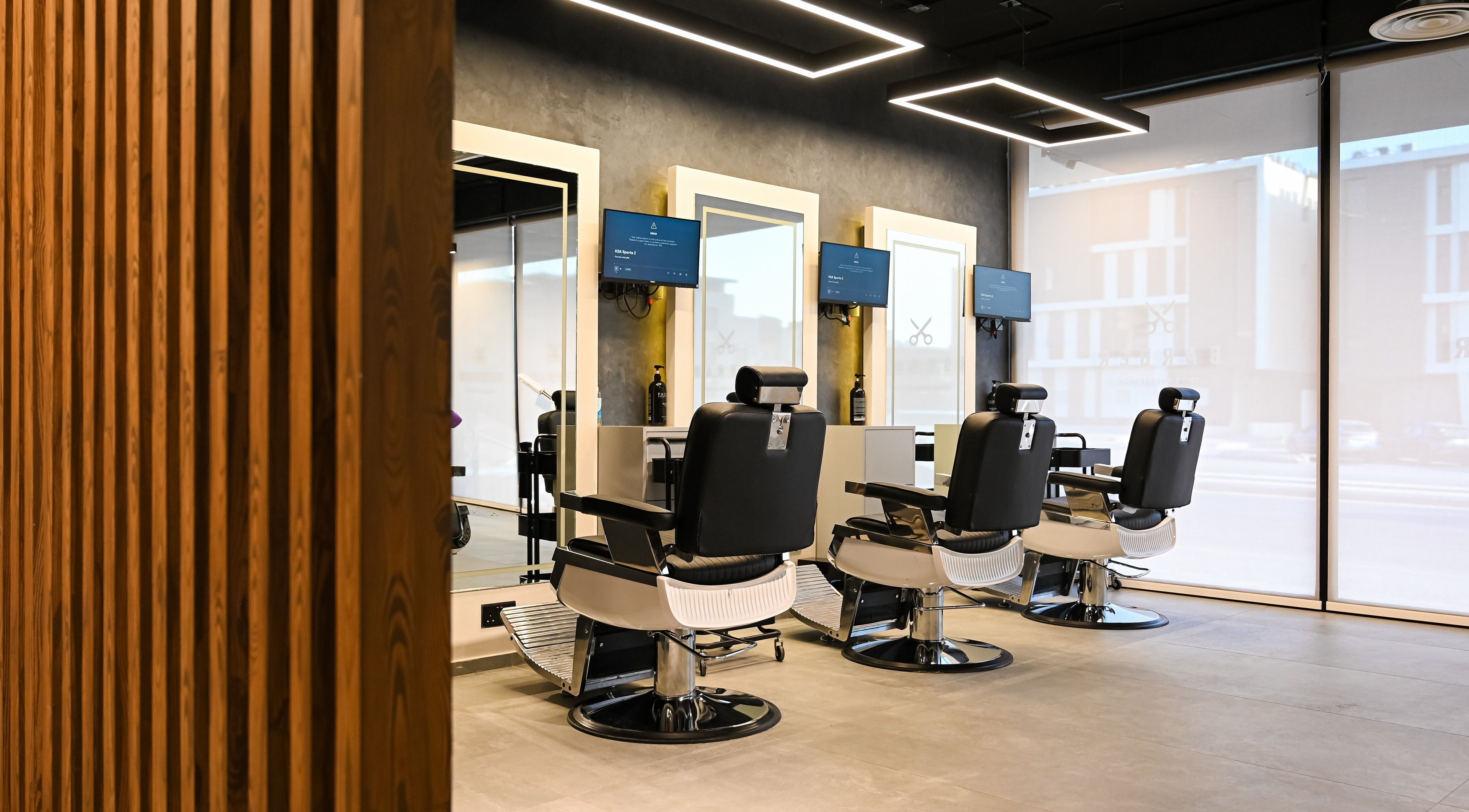Modern barber chairs at Two's Barbershop, Riyadh, Riyadh Province, SA.