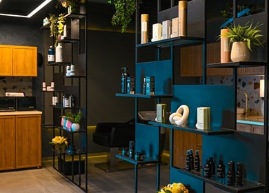 Modern product display at Two's Barbershop in Riyadh, Riyadh Province, SA, featuring sleek shelves.