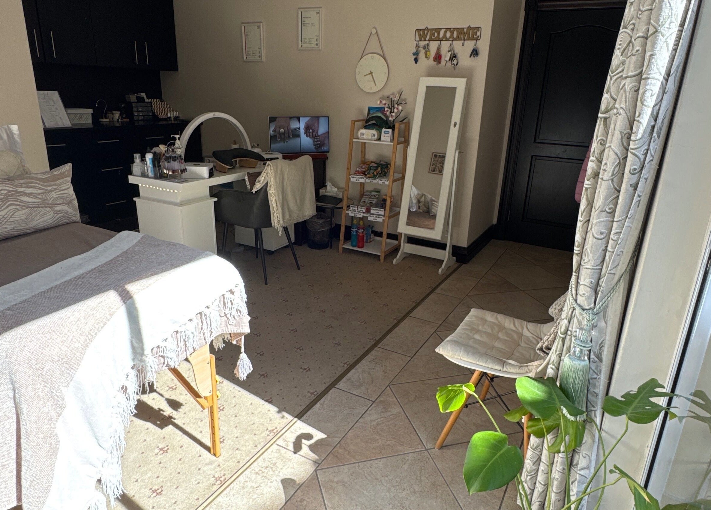 Serene beauty room at Nails by Lara, Gqeberha, Eastern Cape, ZA with cozy decor and relaxing ambiance.