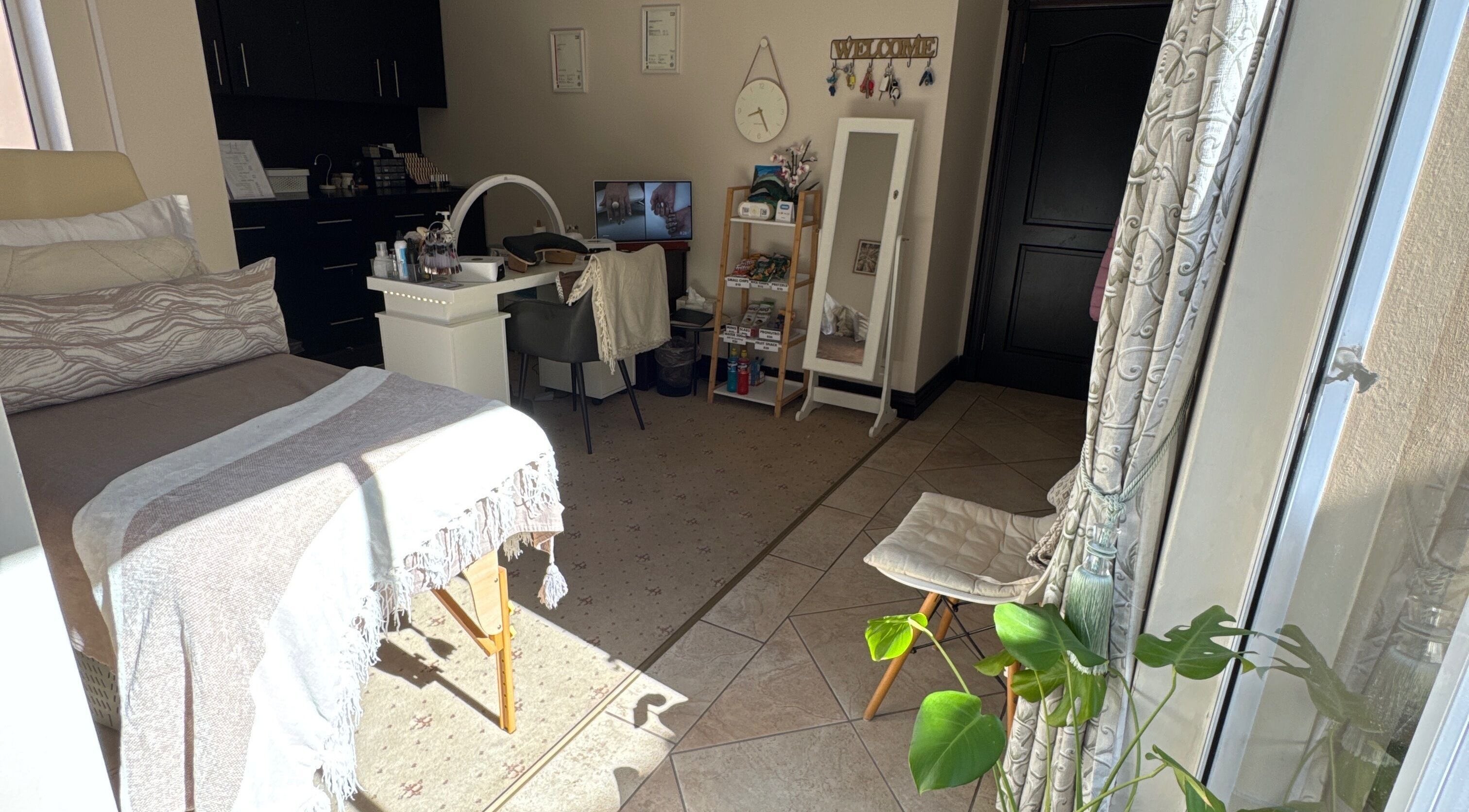 Serene beauty room at Nails by Lara, Gqeberha, Eastern Cape, ZA with cozy decor and relaxing ambiance.