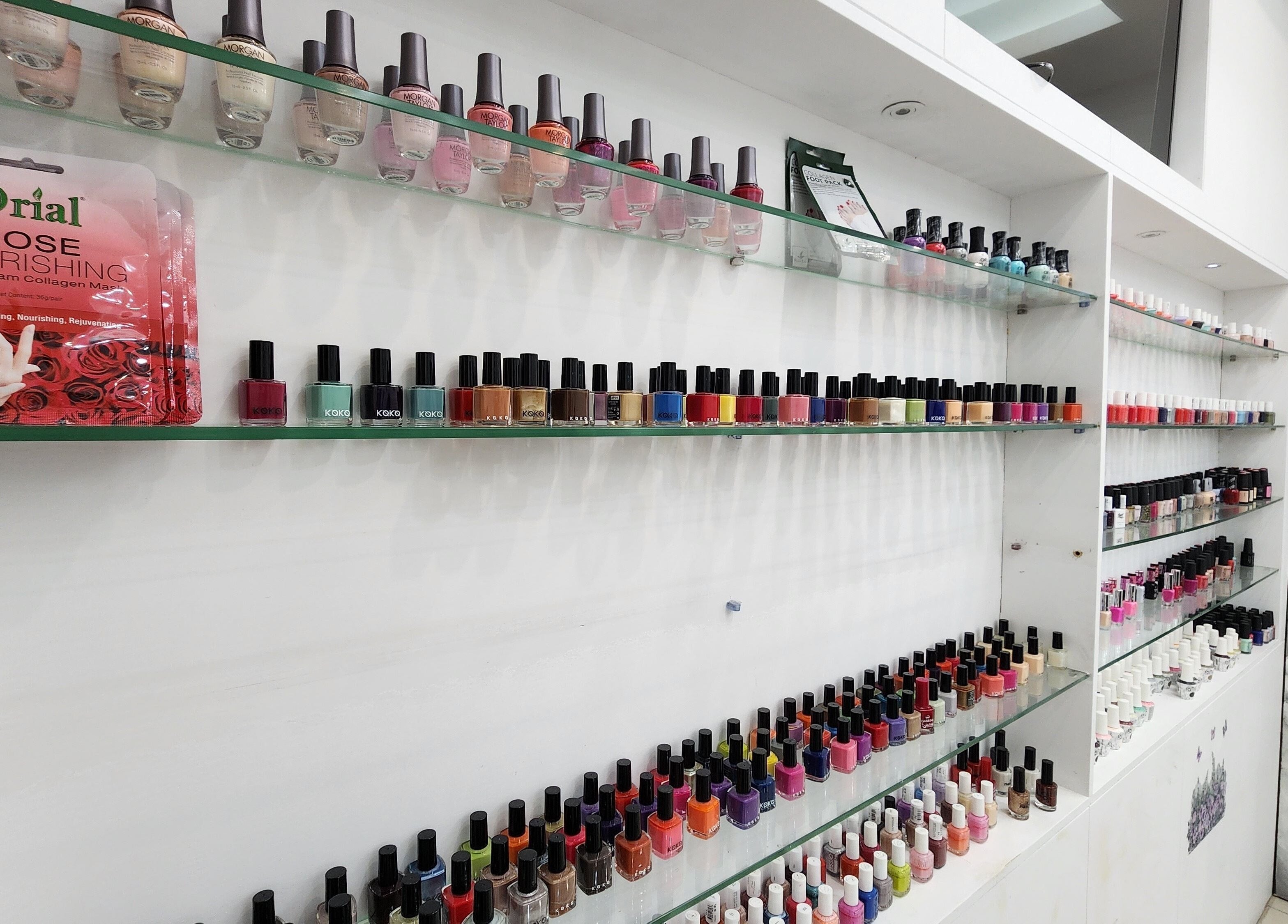 Colorful nail polish display at Cut and Colours Beauty Center, Abu Dhabi, Abu Dhabi, AE.