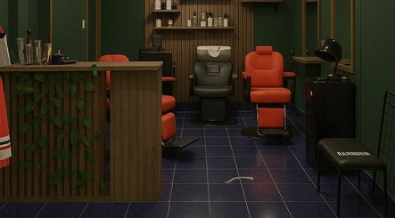 Interior elegante de Barberia Kingsmancut en Tuluá, Valle Del Cauca, CO con sillones rojos y decoración moderna.