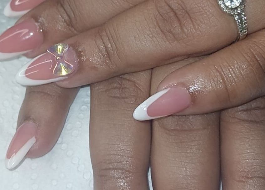 Elegant French manicure with rhinestones at N&h nail bar, Humansdorp, Eastern Cape, ZA.