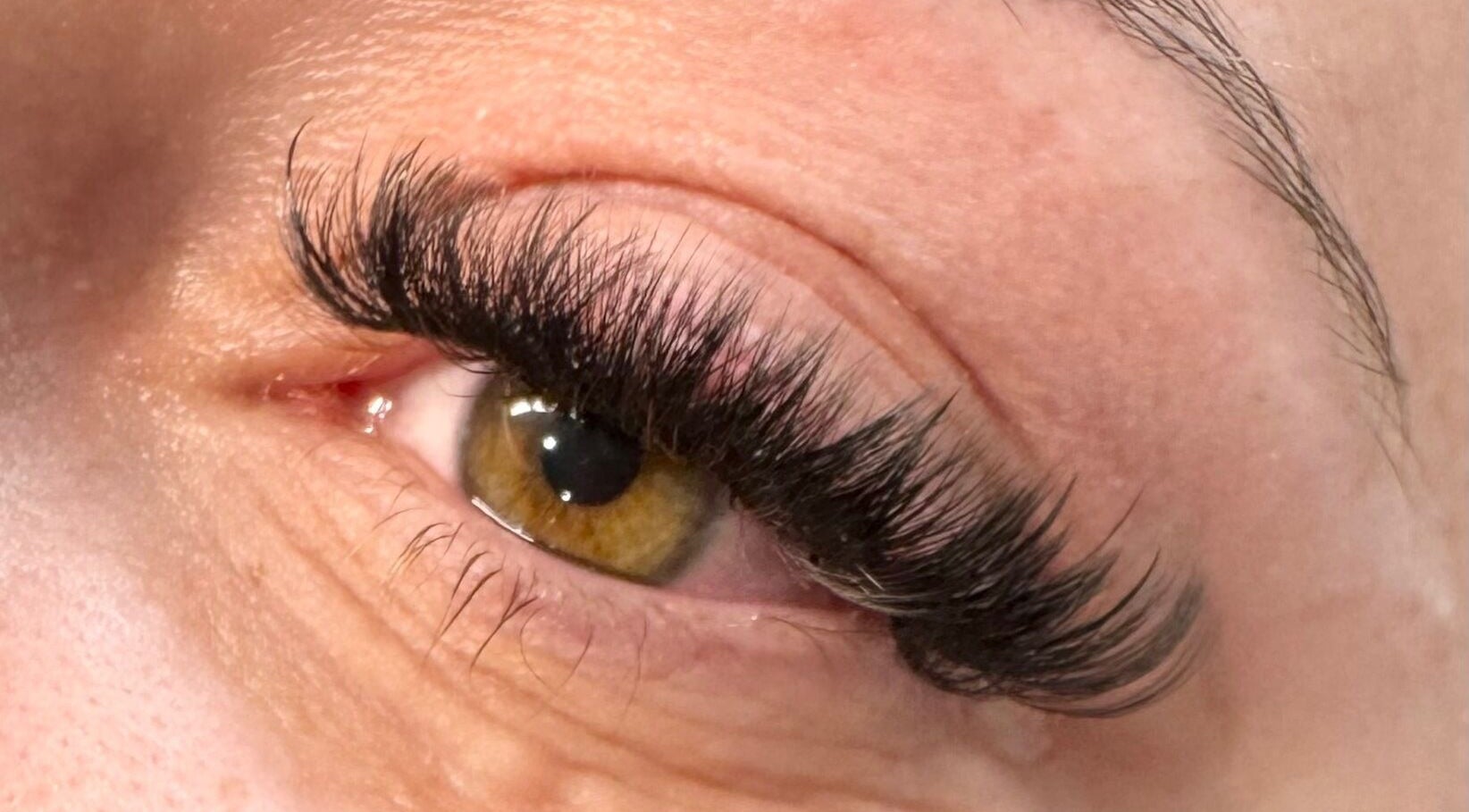Close-up of enhanced lashes at Lash and Browtique, Nuthall, England, GB, showcasing expert styling.