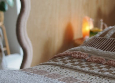 Cozy spa bed setup at Beauty by Emma, Matamata, Waikato, NZ, with warm ambient lighting.