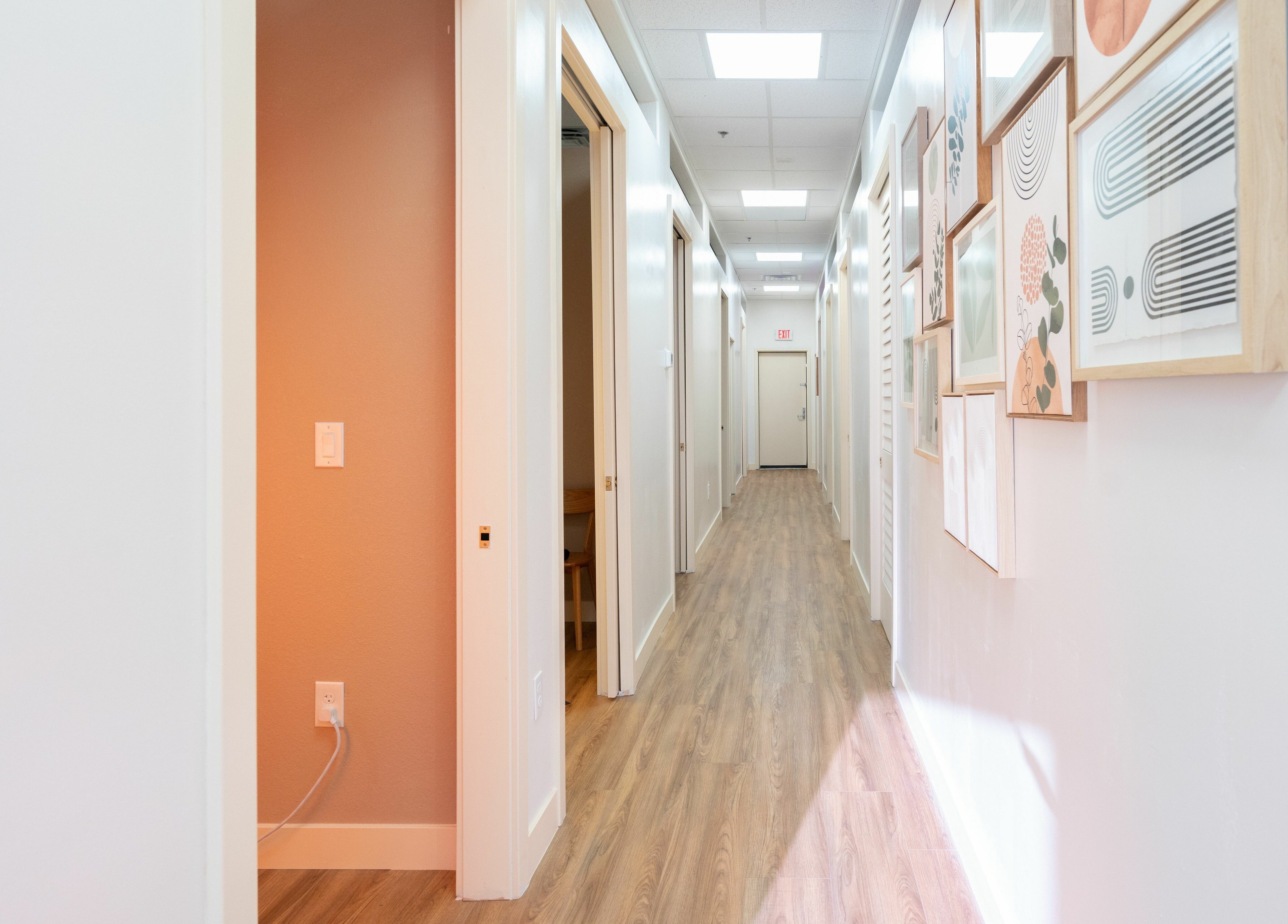Bright hallway at Glo House Sun Spa and Wellness Center in Las Vegas, Nevada. Modern decor and soothing atmosphere.