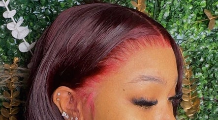 Stylish hair highlights at Slayed By Adora, Mount Vernon, New York, US, showcasing vibrant color.